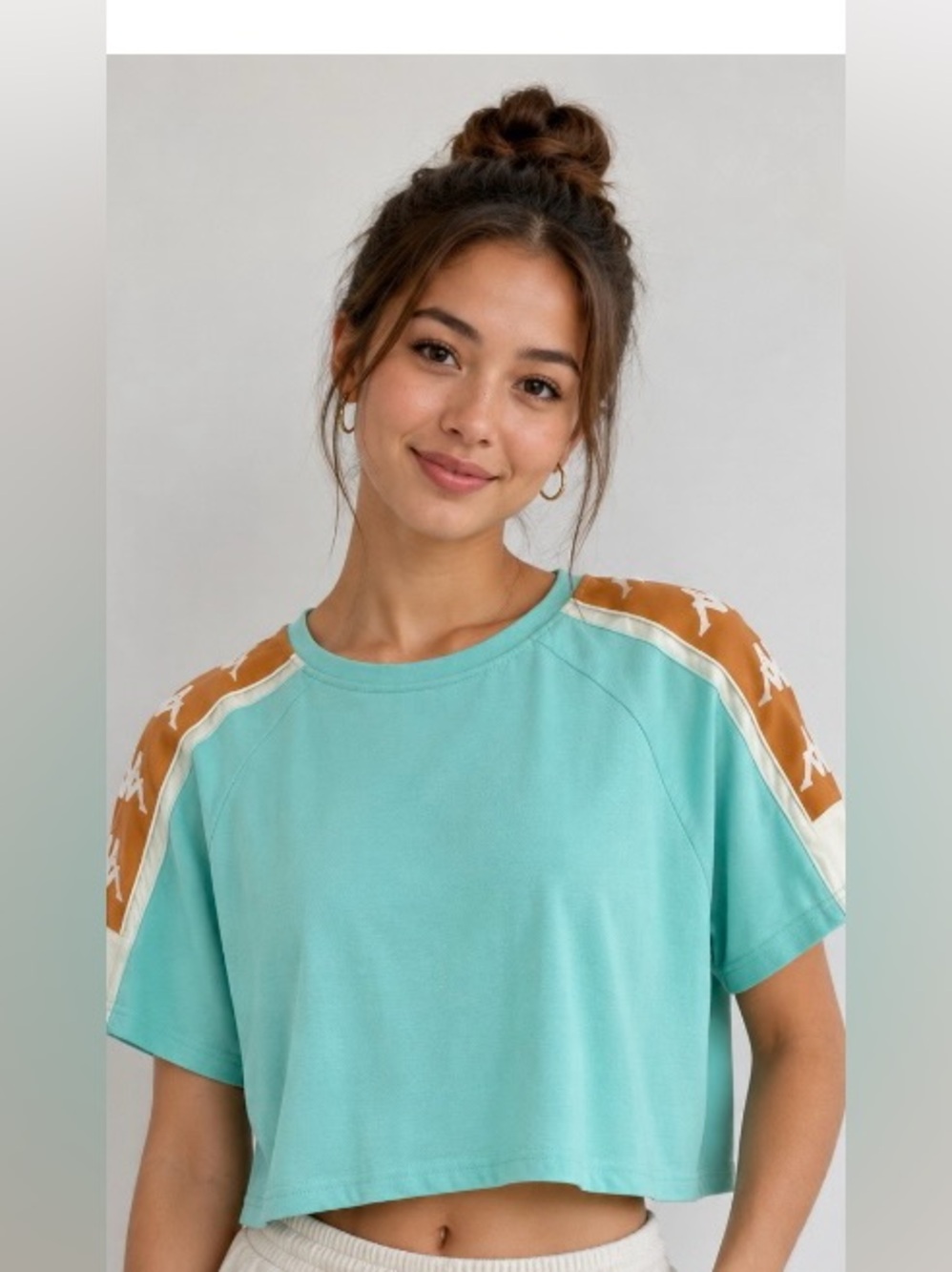 Women’s Kappa Crop Tee with Gold Logo Shoulder Tape, size Large; new with tags.